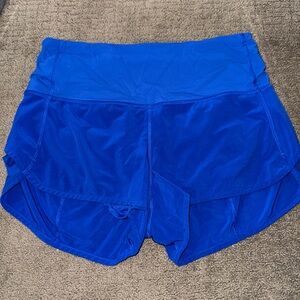 blue high waisted lululemon speed up shorts